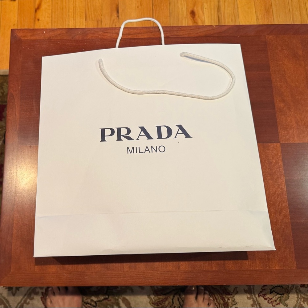 NWT PRADA White Paper Shopping Bag with Iconic Logo. Size: 13.5”x14”